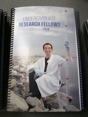 Neal on the cover of the undergraduate research fellow guidebook