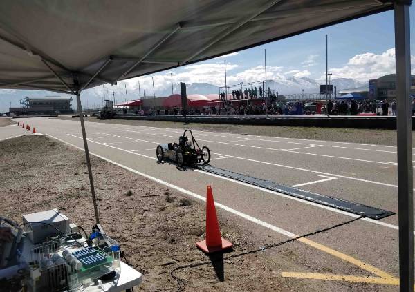 car after passing over the charging strip on the track