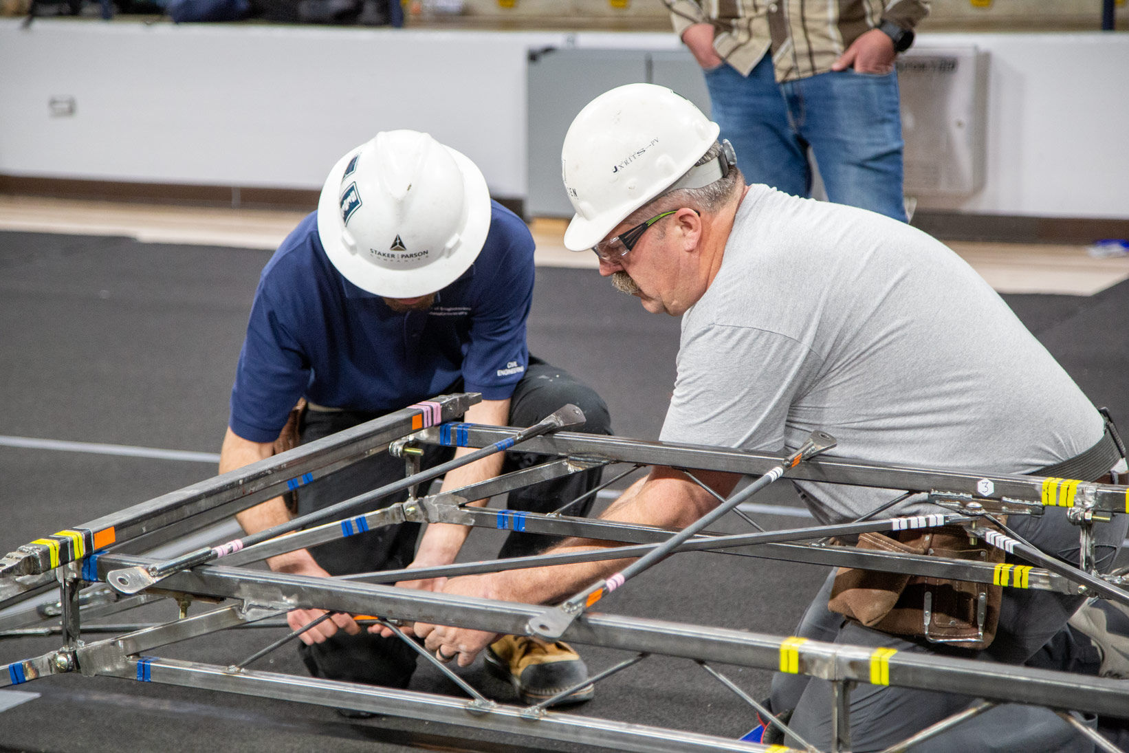 The Student Steel Bridge Competition challenges students to extend their classroom knowledge to a practical and hands-on steel-design project.